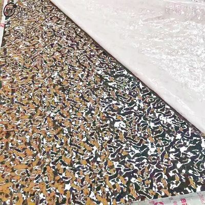 Harga yang bagus KTV Langit-langit 304 Big Sliver Air Ripple Embossed Mirror 8k Dekorasi Lembar Baja Rantai on line